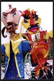Two big heads on poles Two big heads on poles