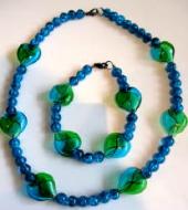 blue and green glass beads. Photo: blue and green glass beads.