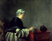 Photo: a lady taking tea.