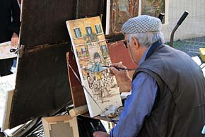 Photo: Artist in Rome square.