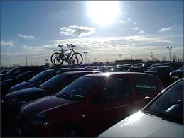 Photo: Bike on roof of car.