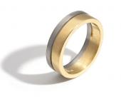 Photo: gold n silver ring.