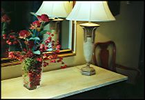 Photo: Hotel mirror and flowers.