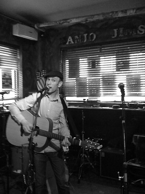 Photo: Jim playing at Banjo Jim's Canada.