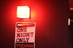 Photo: One night only poster and light.