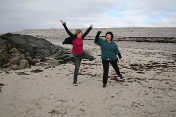 Pat and issi throwing stones at the pebble beach. Photo: Pat and issi throwing stones at the pebble beach.