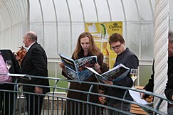 Photo: West End Festival - reading the programme.