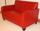 Photo: red leather couch.