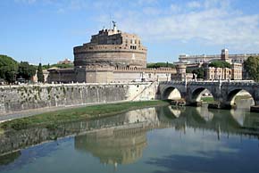 Photo: Round building and bridge.
