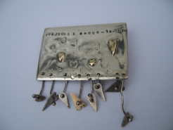 silver brooch. Photo: silver brooch.