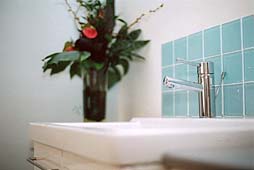 Photo: Sink and flowers.