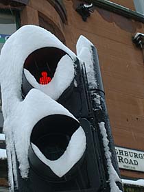 Photo: Red man obscured by snow.