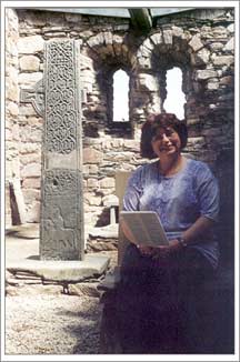 Pat sitting in 12th Century church ruin