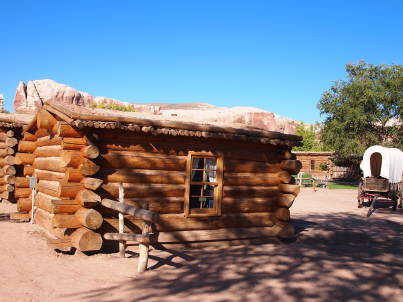 Photo: cabin and wagon.