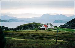 Photo: Highland houses and loch view.