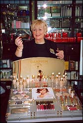 Photo: Mary Bell at beauty counter.