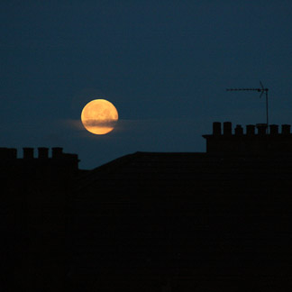 Photo: Glasgow West End moon above the chimney pots.