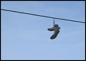 Photo: Shoes hung on telephone wire.