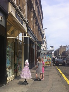 It was so hot today even the mannequins had to go out for some air.