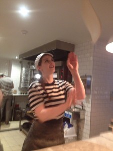 tossing pizza