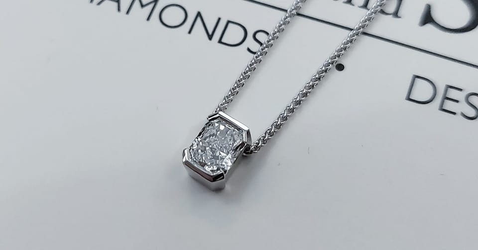 white gold and diamond pendant