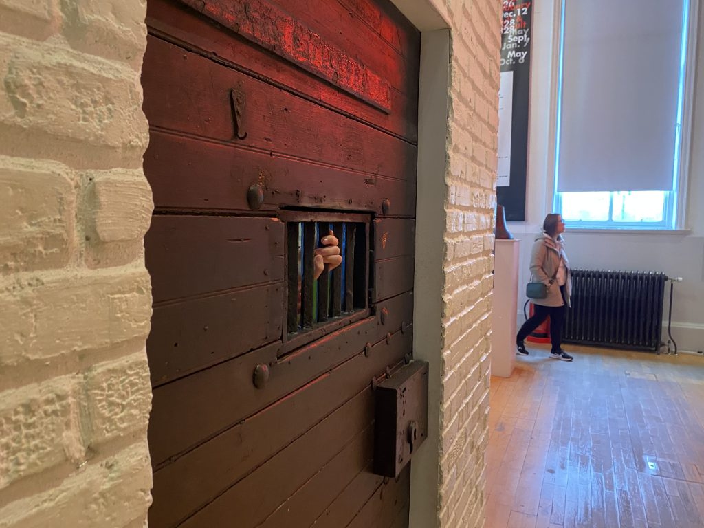 Jail cell door with bars